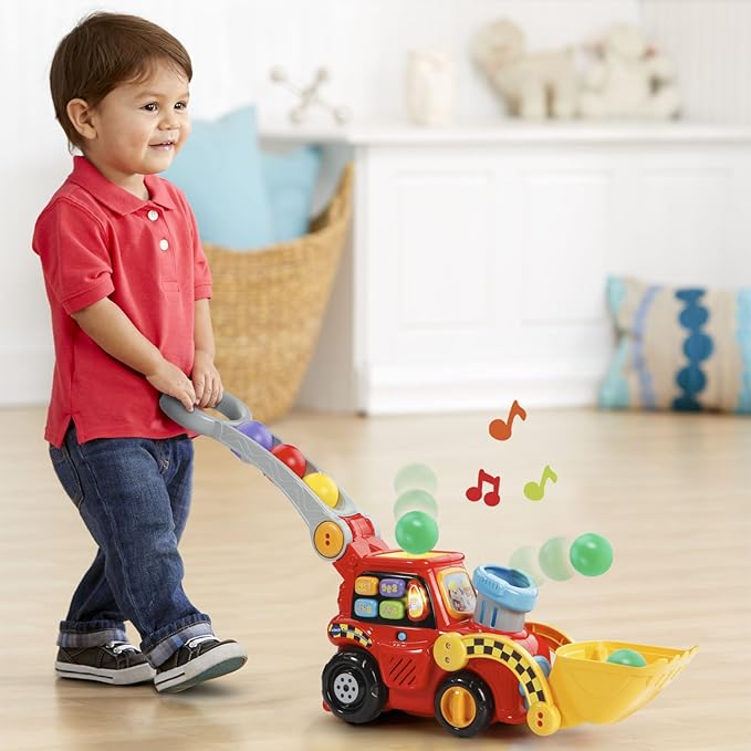 A toddler joyfully taking a stroll with his pop Bulldozer.A perfect sensory toy for babies and toddlers.